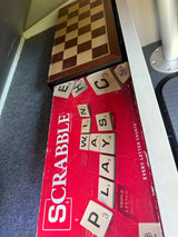 Scrabble and a chessboard inside an RV rental, offering classic board game fun for your road trip adventures.