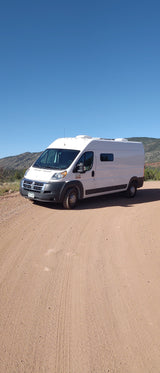 By Denver International Airport, a heated cabin on wheels