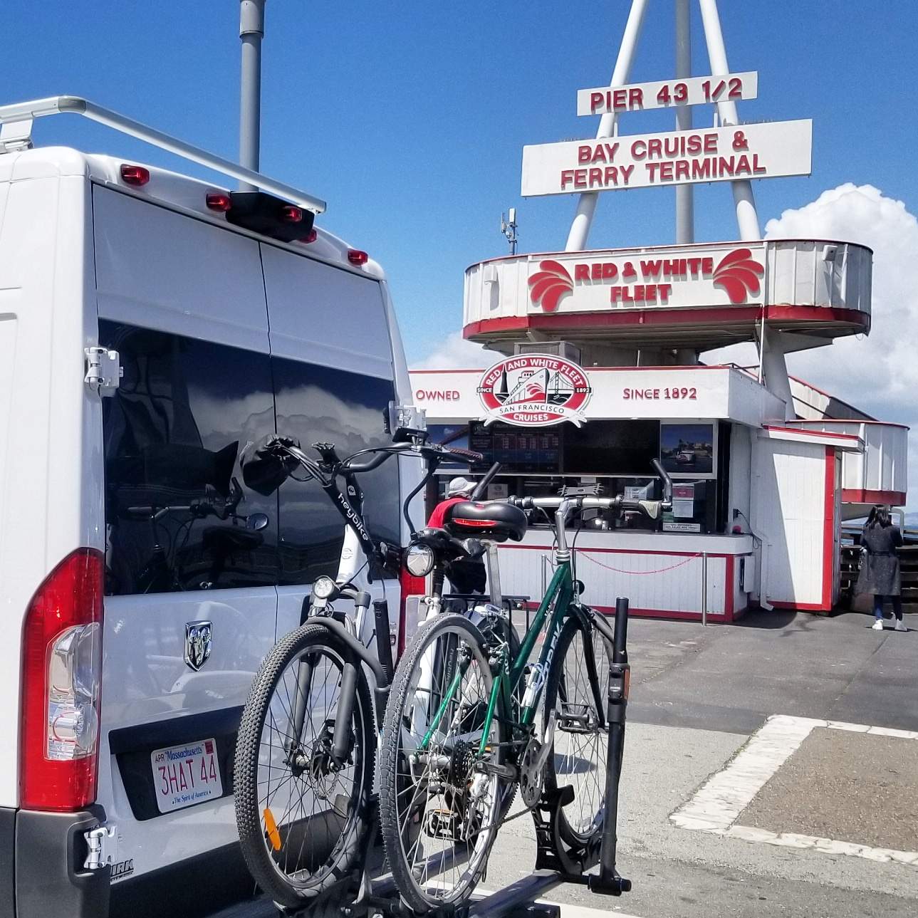 An RV rental van with bikes ready for adventure at San Francisco's Pier 43 1/2, a Bay Cruise terminal.