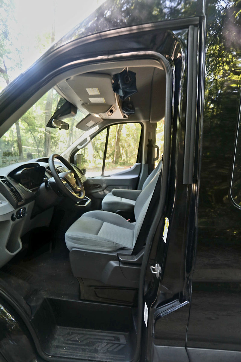  ready for adventure.|This RV rental shows a compact camper van interior with a bed — photo 12