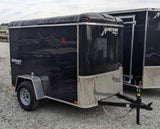 Black Homesteader Challenger cargo trailer, great for extra storage with an RV rental trip.