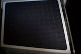 Close-up of a black, textured non-slip step for an RV rental, ensuring safe access.
