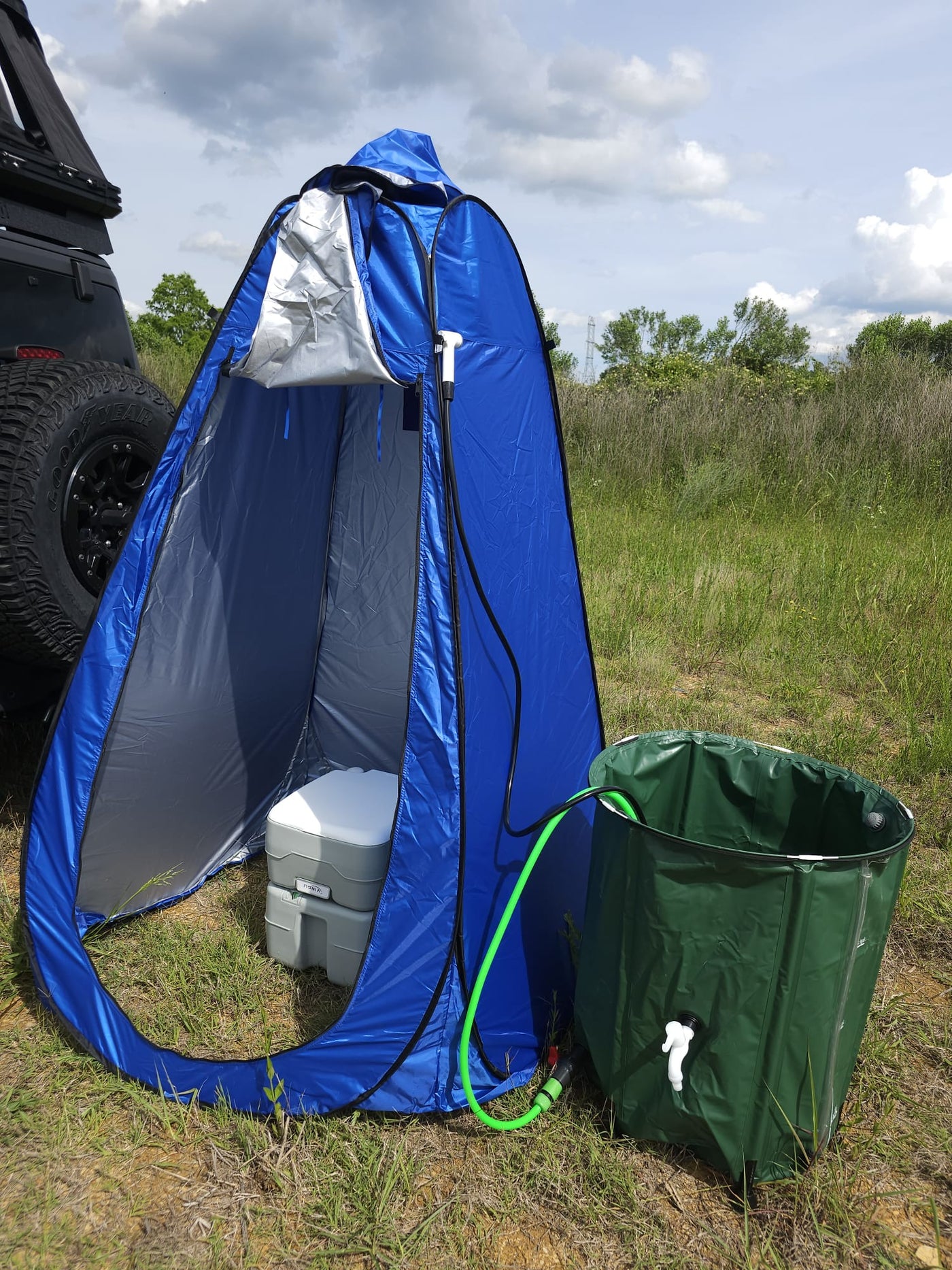  essential for towing. A spare tire and North Carolina license plate are visible.|RV rental dashboard displays '4x4 Shift in Progress' message — photo 4