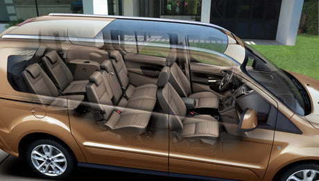 Brown passenger van, transparent body showing spacious multi-row seating. Ideal for an RV rental trip or large group transport.