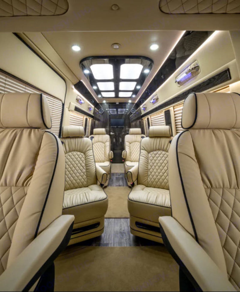  light-colored seating. Perfect for premium rv rental experiences.|Mercedes-Benz Sprinter Ultimate Coach RV rental floor plan: an overhead view of a luxury van's detailed interior.|Experience premium comfort in this luxury RV rental — photo 3