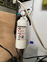 RV rental safety: A Kidde fire extinguisher and portable power station (1500W surge) provide essential safety & power.