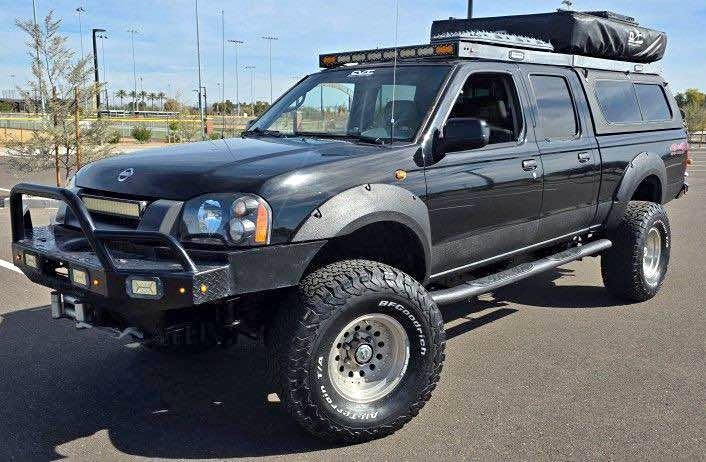 2002 Nissan Frontier Crew Cab · XE Pickup 4D 6 ft