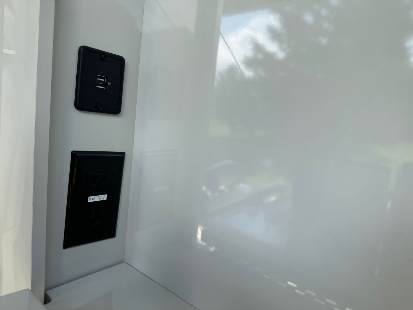 Stay charged in your RV rental! USB ports and a GFCI protected outlet integrated into the wall.