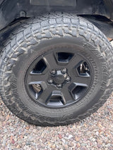 Four Jeep Rims with tires in Tucson, AZ (photo 4)