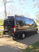 Sleek Class B RV rental, a Thor Sequence camper van on a Ram ProMaster chassis, with a Thule bike rack.