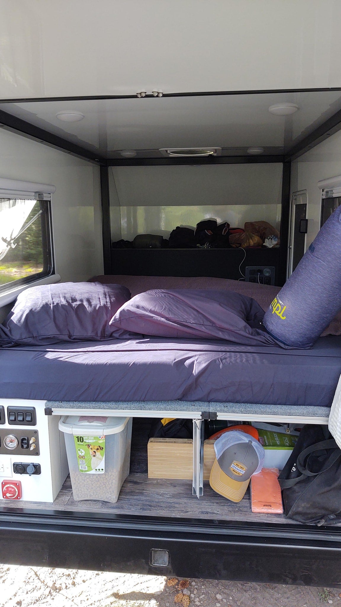 and floor storage.|An RV rental's organized pull-out kitchen — photo 6