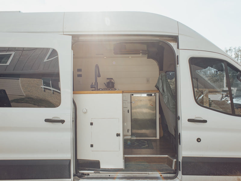  surrounded by trees. Ideal for an RV rental adventure!|Inside this modern **rv rental** — photo 3