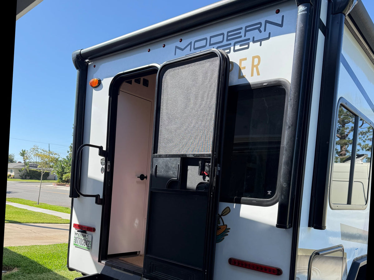  a sleek travel trailer with rugged tires — photo 2