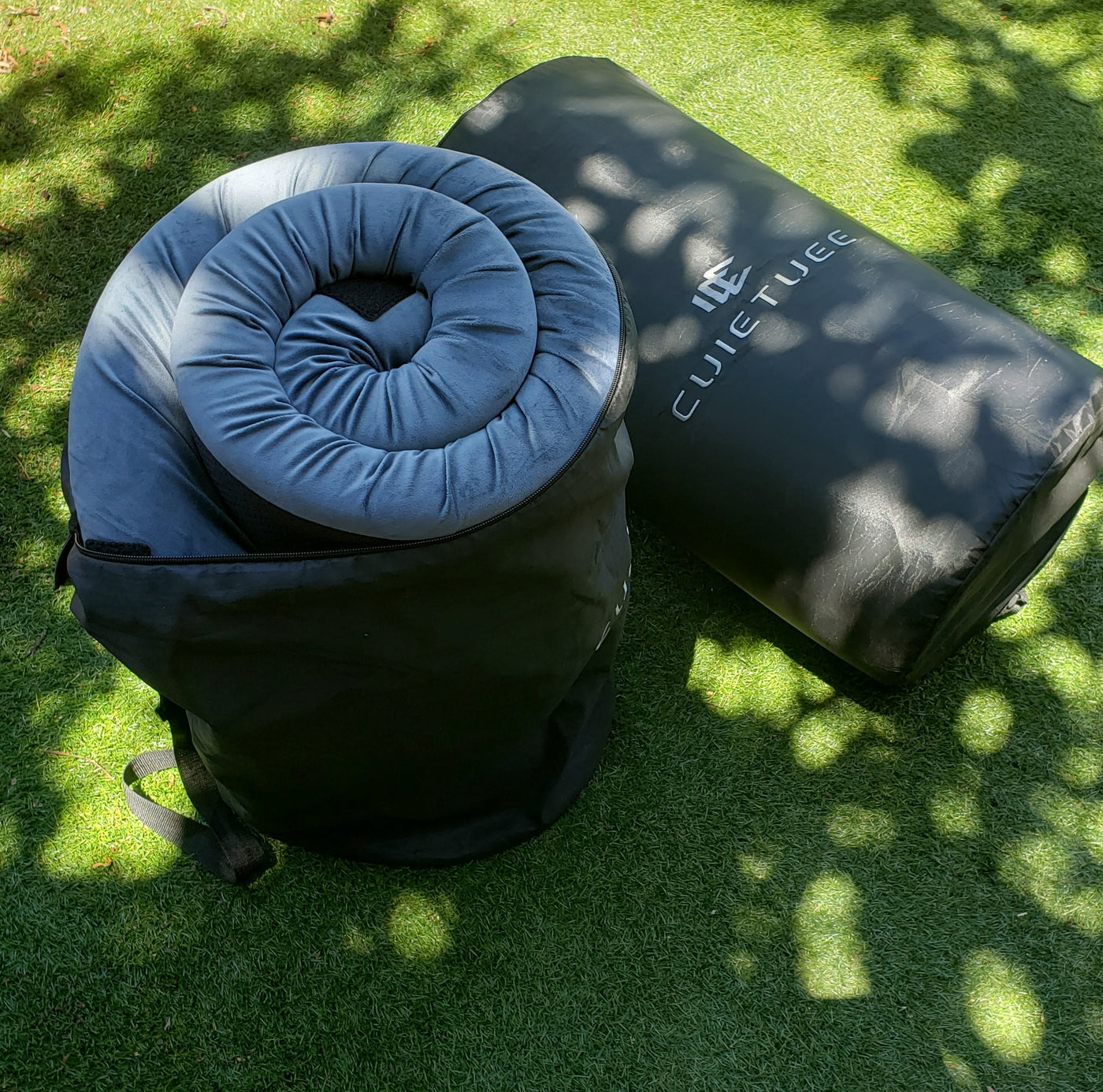 CUIETUEE portable mattress and travel bag on grass, ideal for comfort in your RV rental or camping adventure. — photo 15