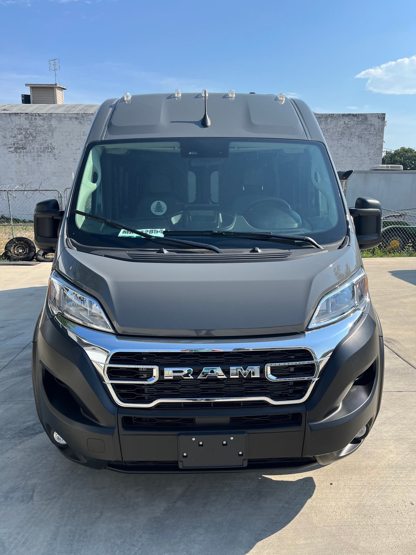  and front lights.|Side view of a modern gray "TWIST" camper van — photo 5