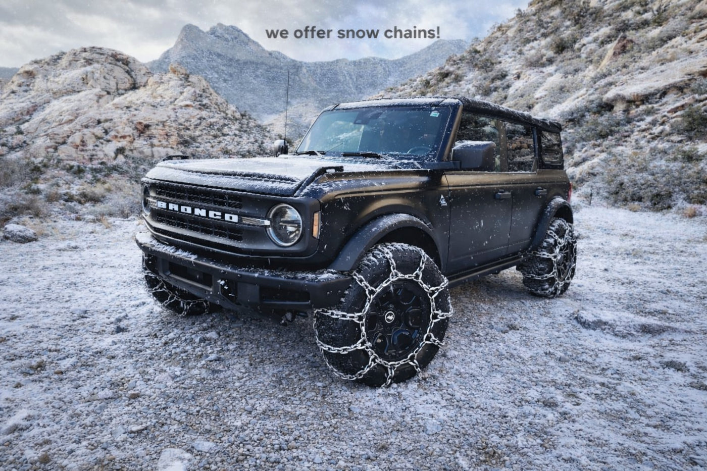  perfect for an RV rental journey.|A rugged black Ford Bronco off-roading in a scenic canyon. Ideal for adventure travel — photo 2