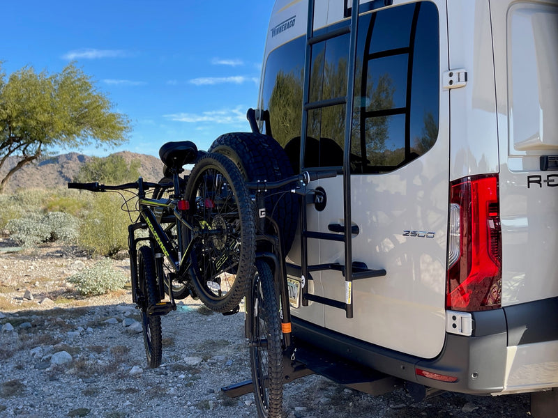  and pan. Perfect for adventurers on the go.|RV rental: Inside a camper van with blue/white bench seating — photo 15