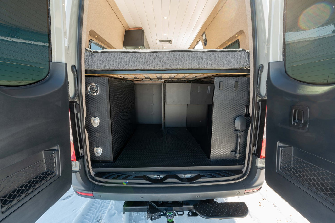  induction cooktop & sink. Compact living on the go.|Cozy RV rental interior with a dinette — photo 8
