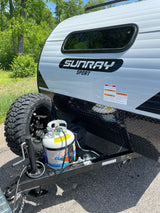 Sunray Sport travel trailer RV rental, ready for adventure with off-road tire, propane, and diamond plate.