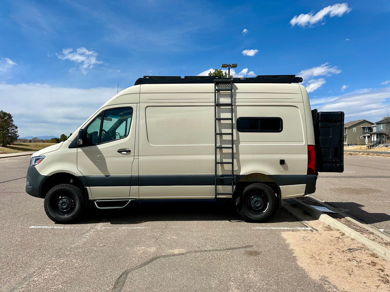  ready for adventure under a blue sky.|Stylish beige Mercedes-Benz Sprinter camper van — photo 3