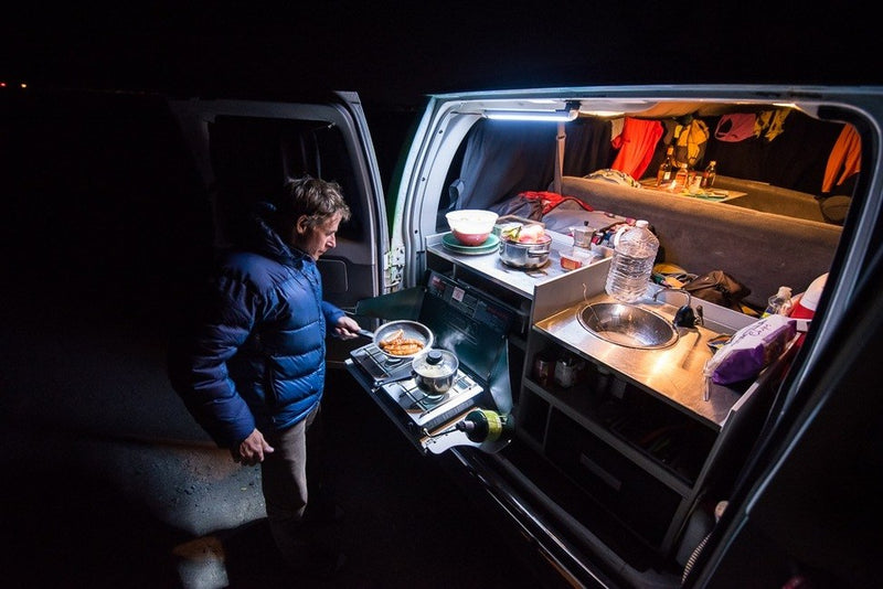  available as an RV rental.|Cooking a meal of rice and stir-fry on an outdoor stove — photo 8