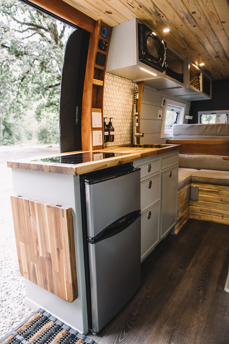  and two passenger seats with seatbelts.|RV rental interior: Swivel front seats — photo 11