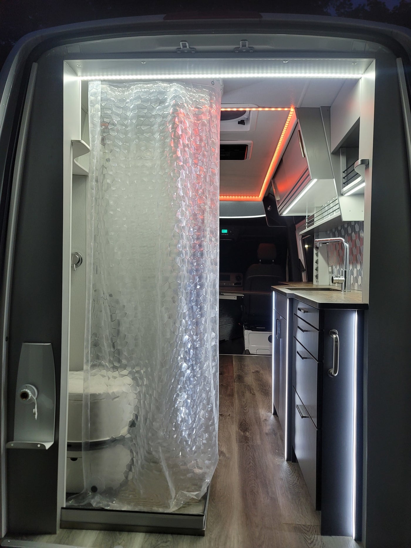  and shower area create a functional mobile home.|An RV rental van — photo 18