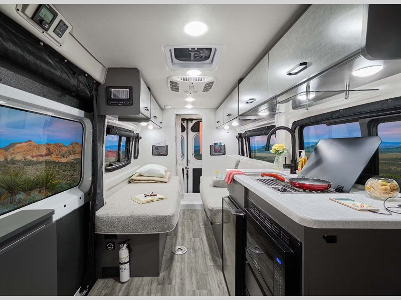  ideal for vanlife.|This compact RV rental bathroom includes a toilet — photo 14