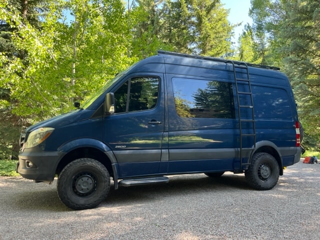  off-road equipped camper van with roof rack and ladder — photo 2