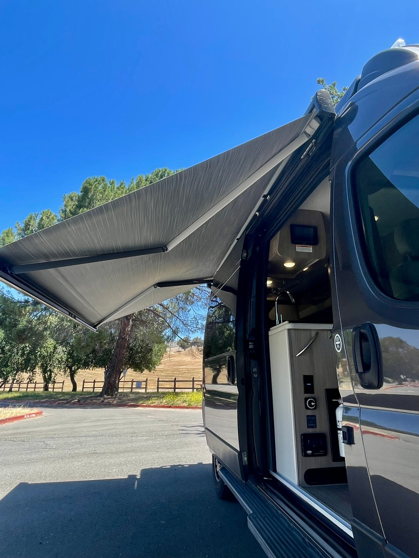  ready for your next trip.|This RV rental's rear features a rooftop AC — photo 9