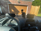 Dashboard view of an RV rental: Bose speaker, phone mount, and navigation screen, ready for the road ahead.