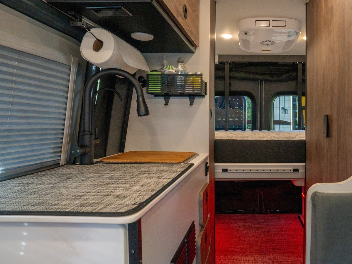  with off-road modifications and a roof rack.|This custom gray Mercedes Sprinter RV rental — photo 20