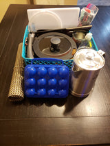 RV rental kitchen kit: Portable cookware, kettle, egg holder, & essentials for easy travel cooking.