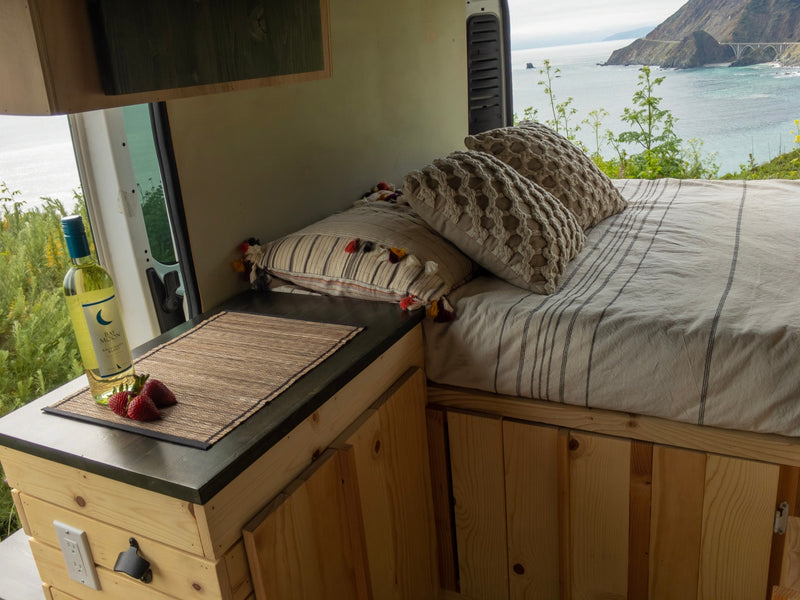  overlooking ocean & mountains.|A white camper van — photo 10