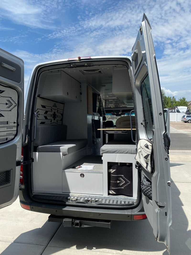  ideal for an RV rental. Features a wooden dinette table — photo 6