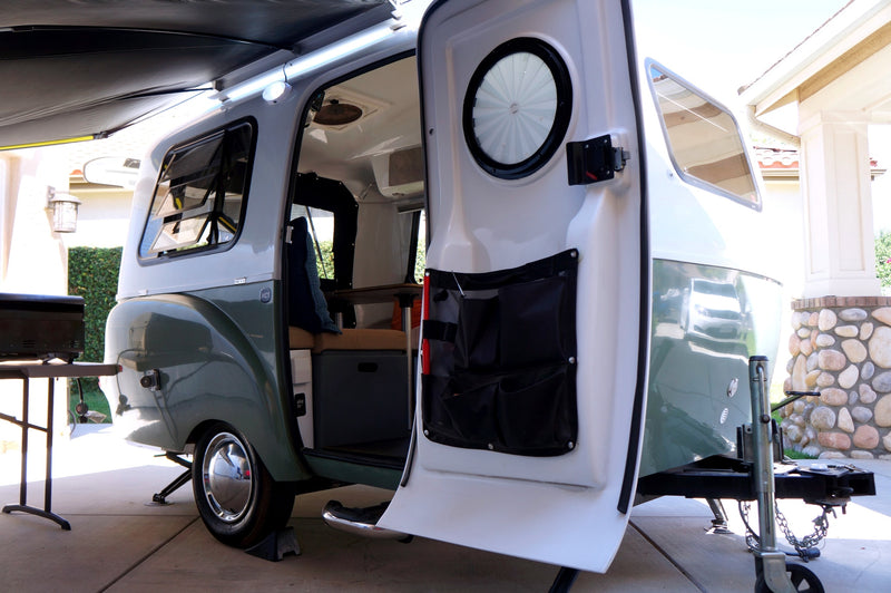 Step into this stylish two-tone travel trailer with open door & extended awning, an ideal RV rental for your next adventure. — photo 10