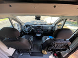 Spacious RV rental interior: Dashboard, steering wheel, and front seats visible for comfortable mobile living.