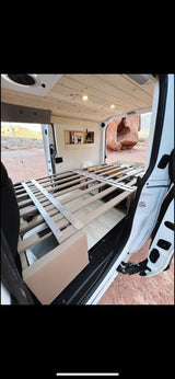  and a bed. Compact living.|An RV rental camper van