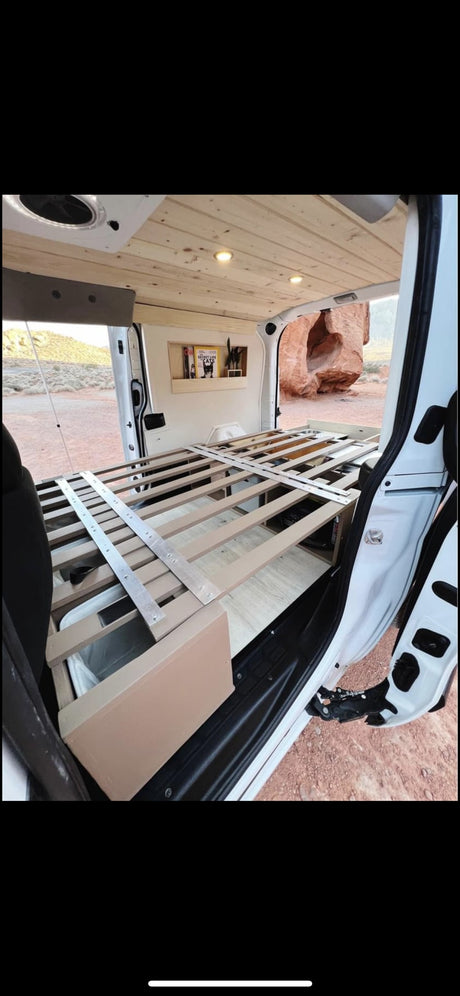  and a bed. Compact living.|An RV rental camper van