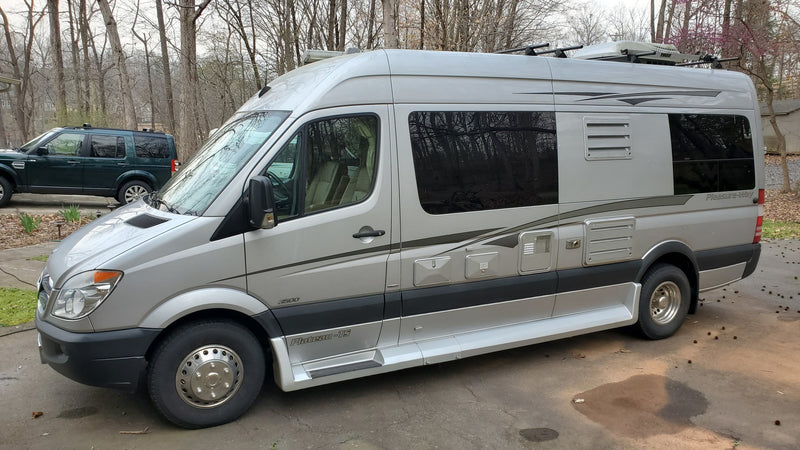  parked outdoors ready for adventure.|Silver Pleasure-Way Class B RV rental — photo 3