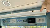 RV rental control panel: Check battery (100%) & water, manage power for cabin, shower, and outlets.