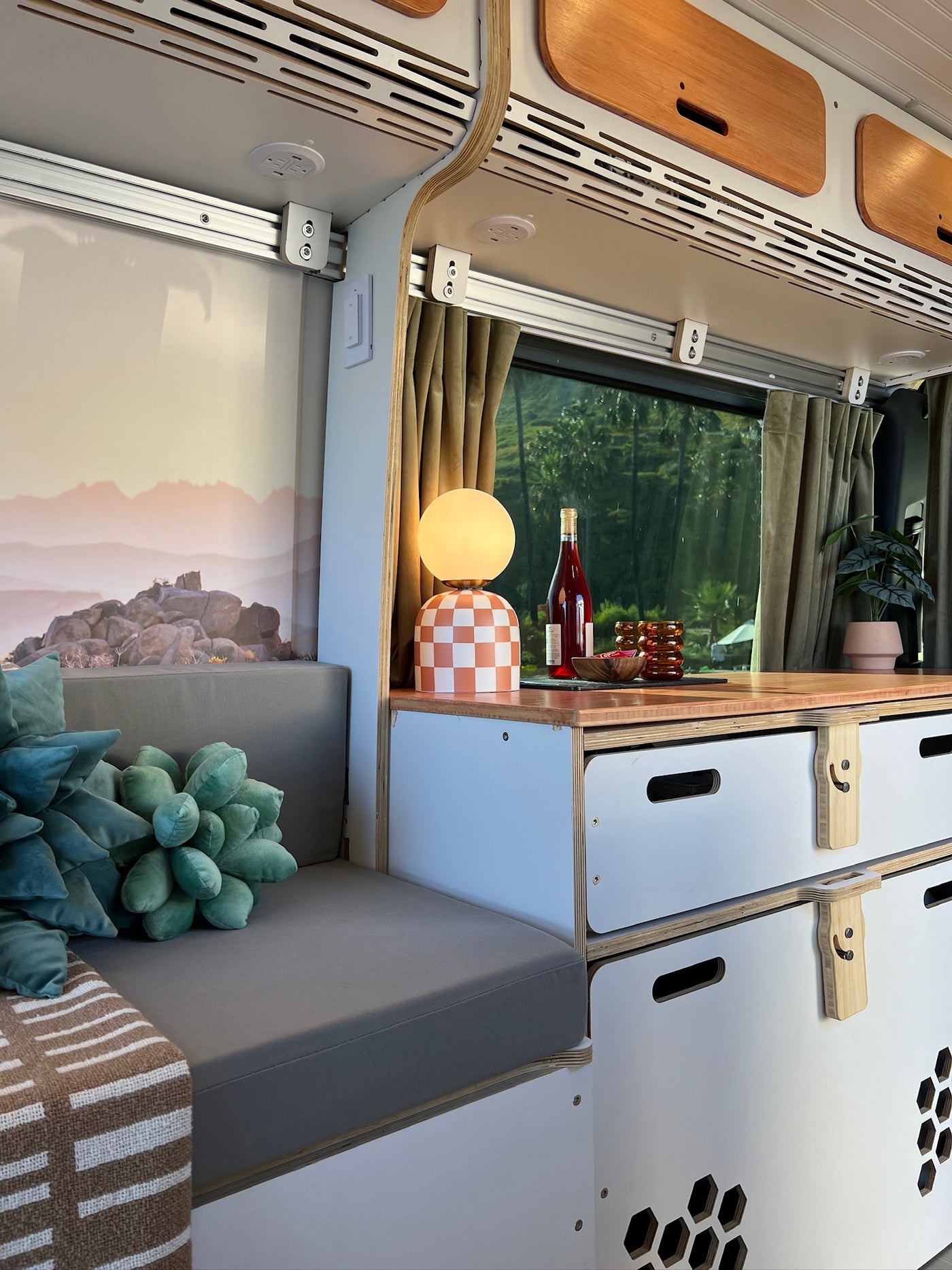  and a ceiling-mounted projector for movies.|**RV rental** interior with a comfortable bed — photo 5