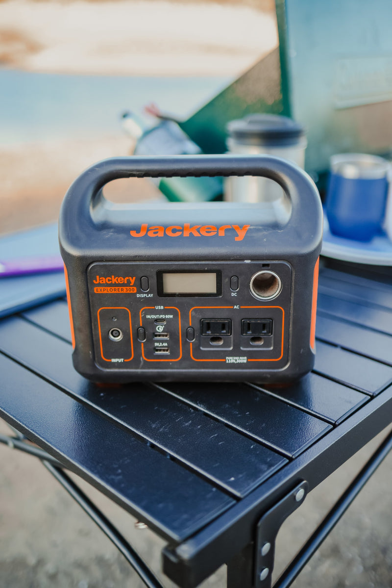 This Jackery Explorer 300 portable power station powers your rv rental adventures, offering reliable charging on the go. — photo 8