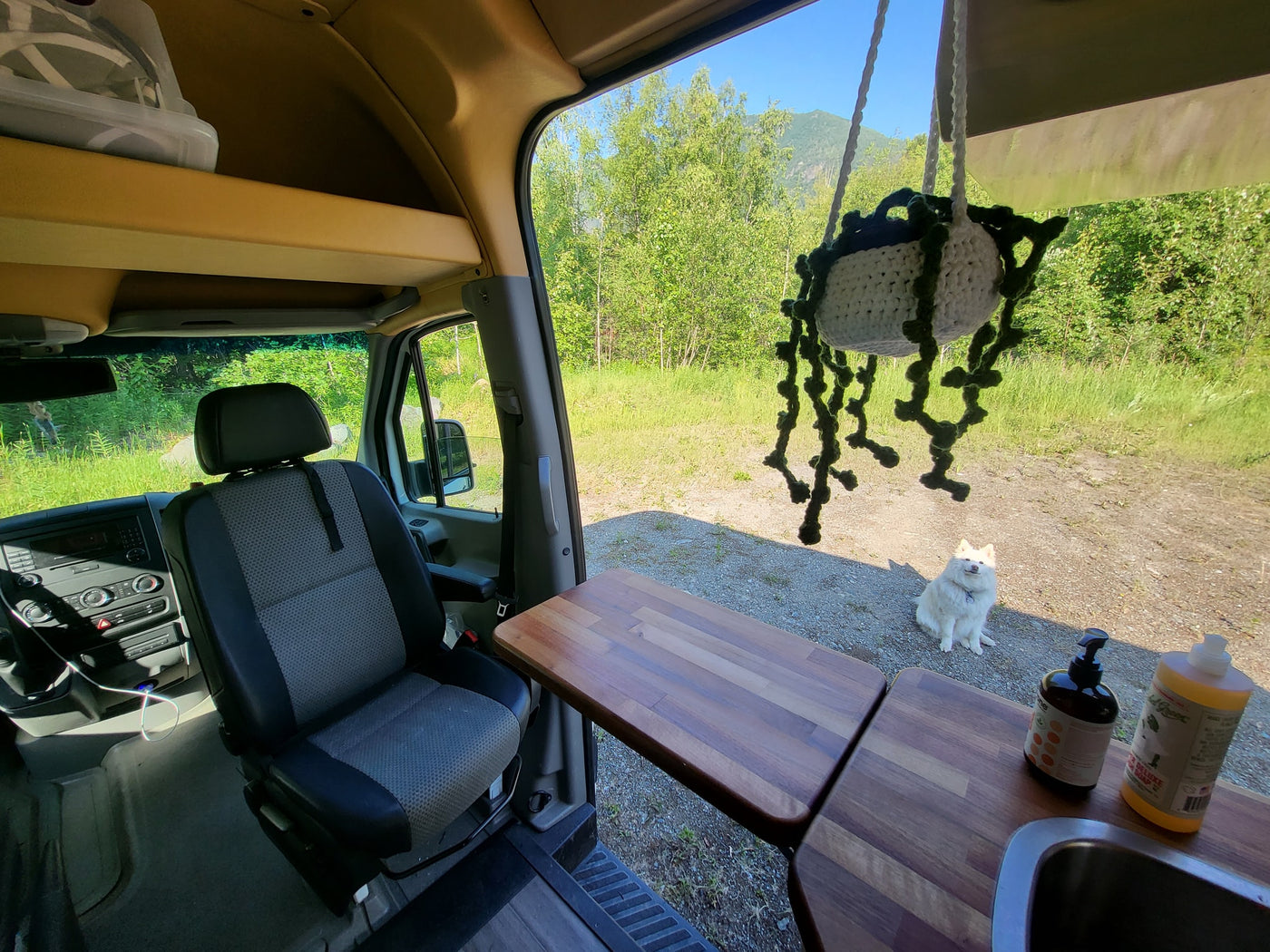  shows custom interior. Ready for your next RV rental adventure!|Custom van kitchen with pull-out table — photo 6