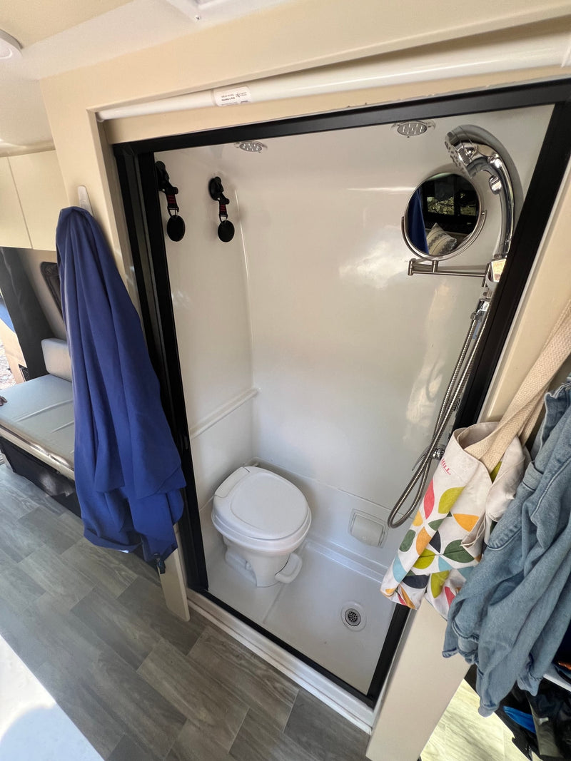  with side door open revealing an interior counter and mesh screen — photo 11