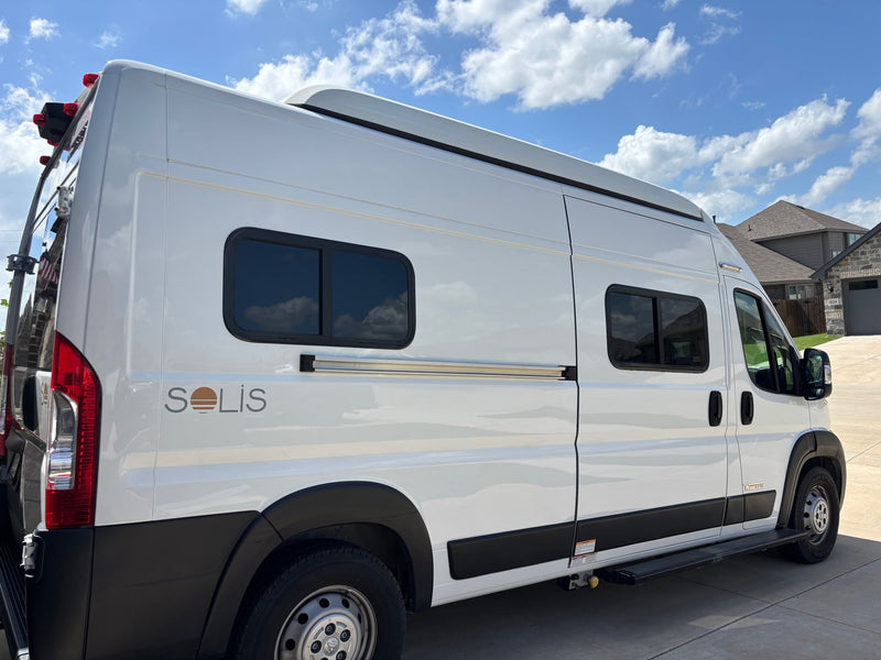 White Winnebago Solis camper van for RV rental — photo 1