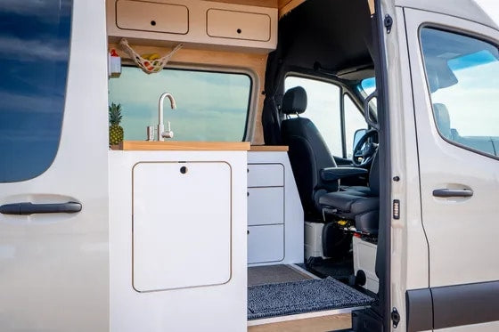  and stunning desert views with saguaro cacti.|Modern RV rental interior: compact kitchen with sink — photo 4