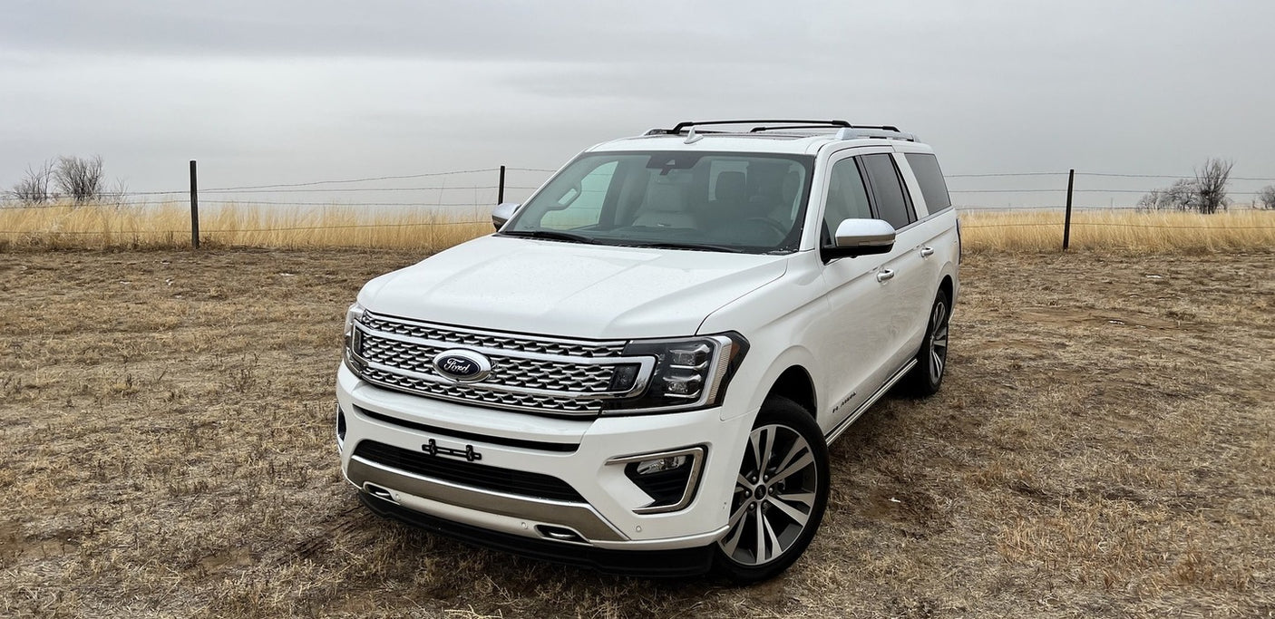 White Ford Expedition SUV for spacious trips. A versatile alternative or companion to your next rv rental adventure.