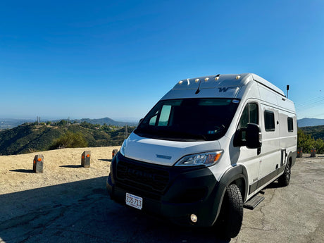  functional space.|This cozy RV rental interior features a compact kitchen with sink
