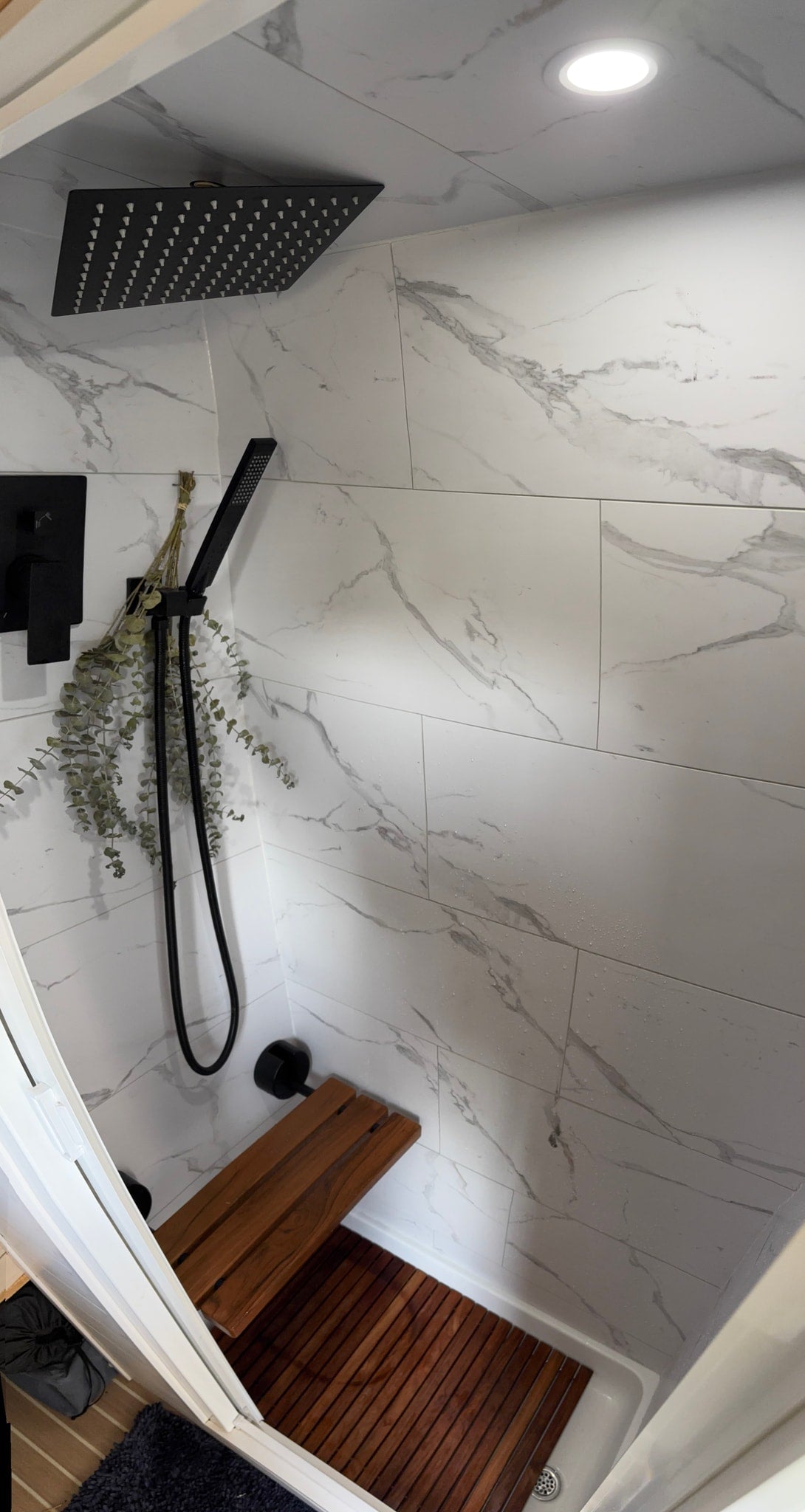  and comfortable passenger seating.|RV rental kitchen: modern black faucet — photo 10